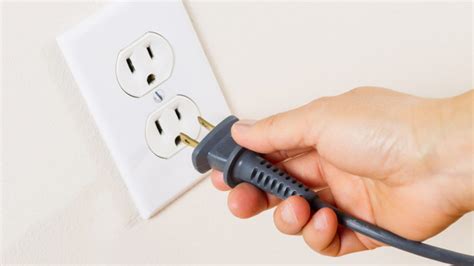 electrical outlet feeling warm